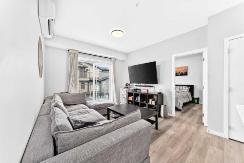 2308-220 Seton Grove Se, Calgary, AB - Indoor Photo Showing Living Room