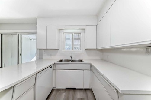 1508 45 Street Se, Calgary, AB - Indoor Photo Showing Kitchen With Double Sink