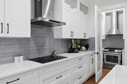 166 Kinniburgh Crescent, Chestermere, AB - Indoor Photo Showing Kitchen With Upgraded Kitchen