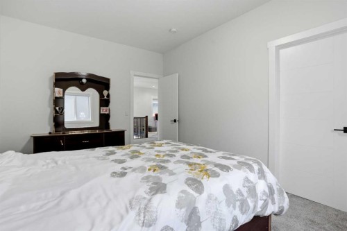 166 Kinniburgh Crescent, Chestermere, AB - Indoor Photo Showing Bedroom