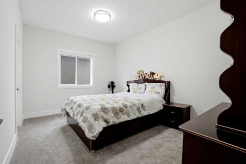 166 Kinniburgh Crescent, Chestermere, AB - Indoor Photo Showing Bedroom
