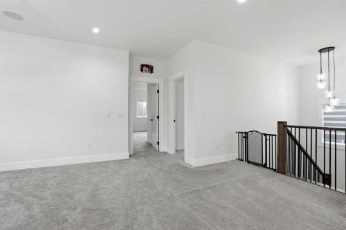 166 Kinniburgh Crescent, Chestermere, AB - Indoor Photo Showing Other Room