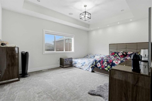 166 Kinniburgh Crescent, Chestermere, AB - Indoor Photo Showing Bedroom