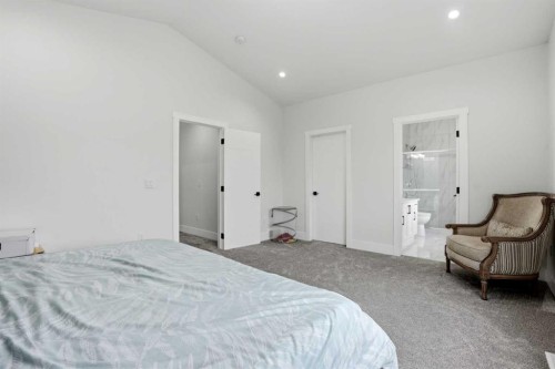 166 Kinniburgh Crescent, Chestermere, AB - Indoor Photo Showing Bedroom