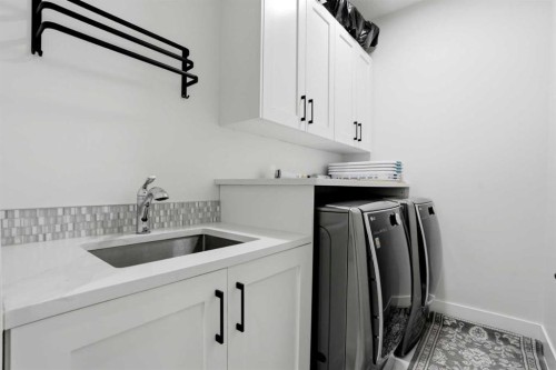 166 Kinniburgh Crescent, Chestermere, AB - Indoor Photo Showing Laundry Room