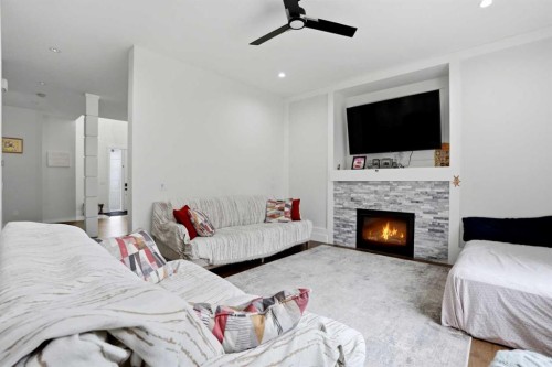 166 Kinniburgh Crescent, Chestermere, AB - Indoor With Fireplace