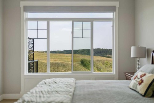 13 Sunvalley View, Cochrane, AB - Indoor Photo Showing Bedroom