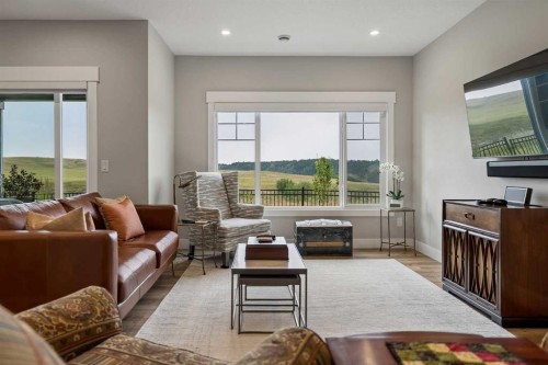 13 Sunvalley View, Cochrane, AB - Indoor Photo Showing Living Room