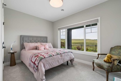 13 Sunvalley View, Cochrane, AB - Indoor Photo Showing Bedroom