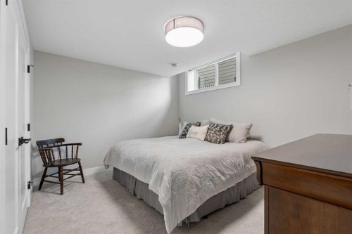 13 Sunvalley View, Cochrane, AB - Indoor Photo Showing Bedroom