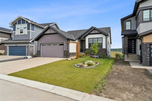 13 Sunvalley View, Cochrane, AB - Outdoor With Facade