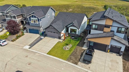 13 Sunvalley View, Cochrane, AB - Outdoor With Facade
