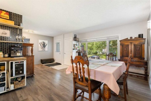 809 68 Avenue Sw, Calgary, AB - Indoor Photo Showing Dining Room