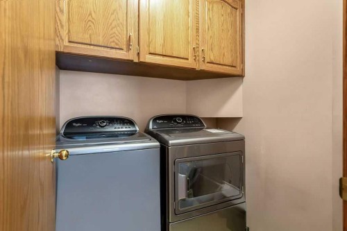 208 Hawkview Manor Place Nw, Calgary, AB - Indoor Photo Showing Laundry Room