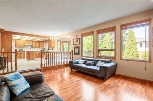 208 Hawkview Manor Place Nw, Calgary, AB - Indoor Photo Showing Living Room