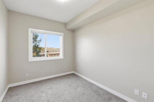 306-4 Sage Hill Terrace Nw, Calgary, AB - Indoor Photo Showing Other Room