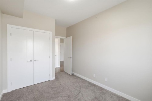 306-4 Sage Hill Terrace Nw, Calgary, AB - Indoor Photo Showing Other Room