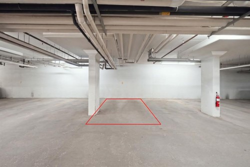 306-4 Sage Hill Terrace Nw, Calgary, AB - Indoor Photo Showing Garage