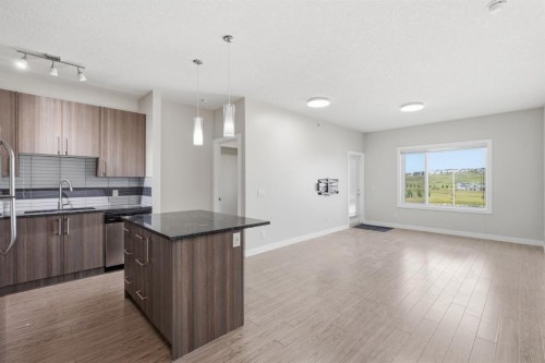 306-4 Sage Hill Terrace Nw, Calgary, AB - Indoor Photo Showing Kitchen With Upgraded Kitchen