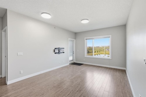 306-4 Sage Hill Terrace Nw, Calgary, AB - Indoor Photo Showing Other Room