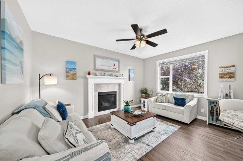 125 Ranch Rise, Strathmore, AB - Indoor Photo Showing Living Room With Fireplace
