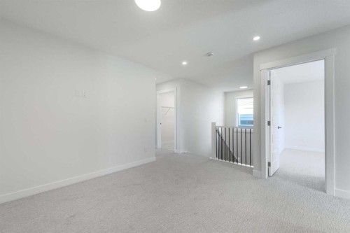 122 Sandpiper Bend, Chestermere, AB - Indoor Photo Showing Other Room