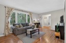 292 Silver Brook Way Nw, Calgary, AB  - Indoor Photo Showing Living Room 