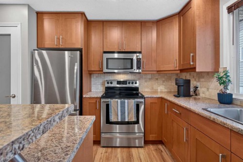 292 Silver Brook Way Nw, Calgary, AB - Indoor Photo Showing Kitchen With Stainless Steel Kitchen