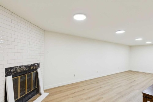 7304 5 Street Sw, Calgary, AB - Indoor With Fireplace