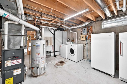 351 Cedarpark Drive Sw, Calgary, AB - Indoor Photo Showing Laundry Room