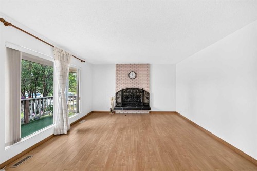 351 Cedarpark Drive Sw, Calgary, AB - Indoor Photo Showing Living Room