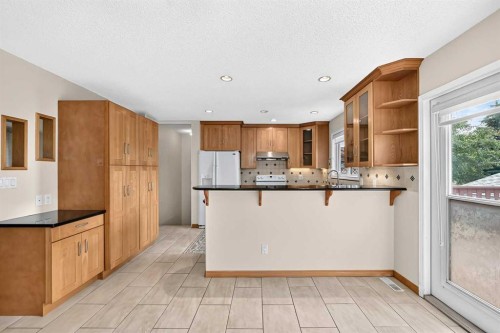 351 Cedarpark Drive Sw, Calgary, AB - Indoor Photo Showing Kitchen