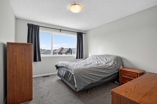 52 Saddlestone Drive Ne, Calgary, AB - Indoor Photo Showing Bedroom