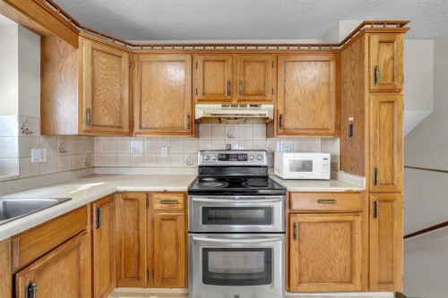 28 Macewan Meadow Link Nw, Calgary, AB - Indoor Photo Showing Kitchen