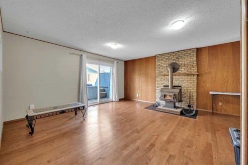 28 Macewan Meadow Link Nw, Calgary, AB - Indoor With Fireplace