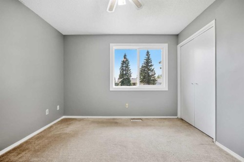 125 Carr Place, Okotoks, AB - Indoor Photo Showing Other Room