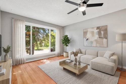 125 Carr Place, Okotoks, AB - Indoor Photo Showing Living Room