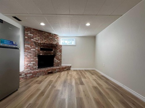 4312 45 Street Sw, Calgary, AB - Indoor With Fireplace