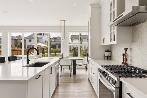 1129 Cranbrook Gardens Se, Calgary, AB - Indoor Photo Showing Kitchen With Upgraded Kitchen