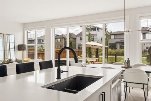 1129 Cranbrook Gardens Se, Calgary, AB - Indoor Photo Showing Kitchen With Double Sink