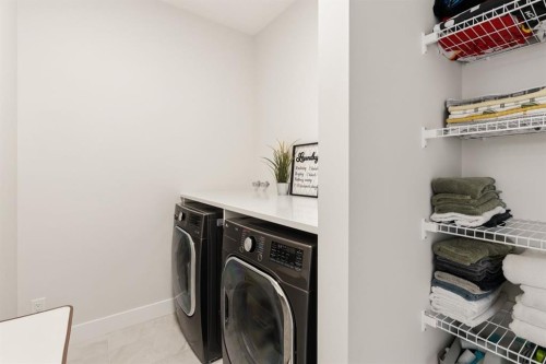 1129 Cranbrook Gardens Se, Calgary, AB - Indoor Photo Showing Laundry Room