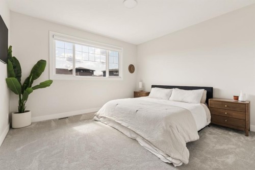 1129 Cranbrook Gardens Se, Calgary, AB - Indoor Photo Showing Bedroom