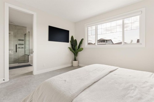 1129 Cranbrook Gardens Se, Calgary, AB - Indoor Photo Showing Bedroom