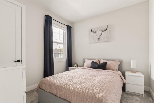 1129 Cranbrook Gardens Se, Calgary, AB - Indoor Photo Showing Bedroom