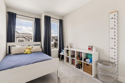 1129 Cranbrook Gardens Se, Calgary, AB - Indoor Photo Showing Bedroom