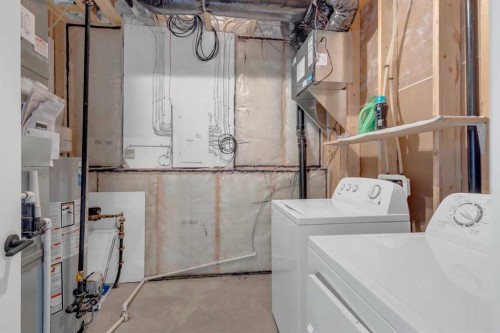 9 Ian Way, Sylvan Lake, AB - Indoor Photo Showing Laundry Room