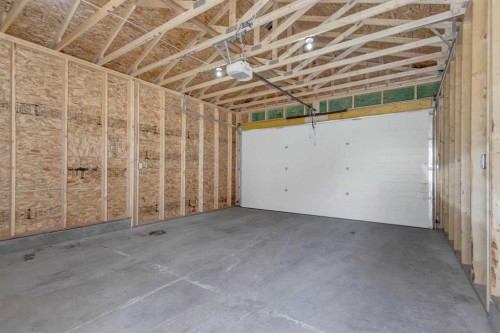 9 Ian Way, Sylvan Lake, AB - Indoor Photo Showing Garage