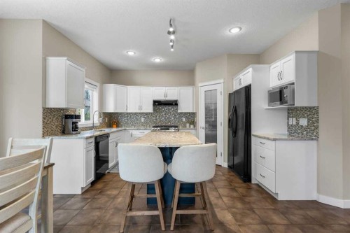 125 Cougarstone Manor Sw, Calgary, AB 