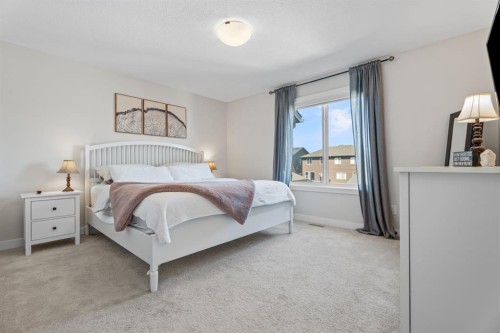 44 D'Arcy Boulevard, Okotoks, AB - Indoor Photo Showing Bedroom