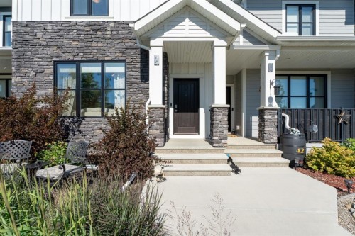 44 D'Arcy Boulevard, Okotoks, AB - Outdoor With Facade